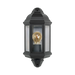 A black outdoor wall lantern light fixture with a clear glass front and a visible warm-toned Edison bulb inside, shown against a plain white background.