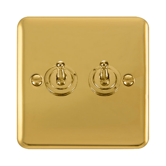 Front view of Click Deco Plus Polished Brass 2G Toggle Switch