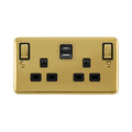 Front view of Click Deco Plus polished brass double USB-A and USB-C socket with black inserts, DPBR586BK
