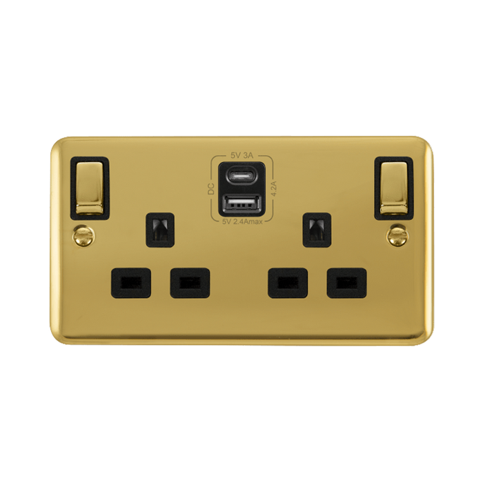 Front view of Click Deco Plus polished brass double USB-A and USB-C socket with black inserts, DPBR586BK