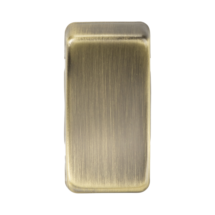 Rectangular brass object on a white background