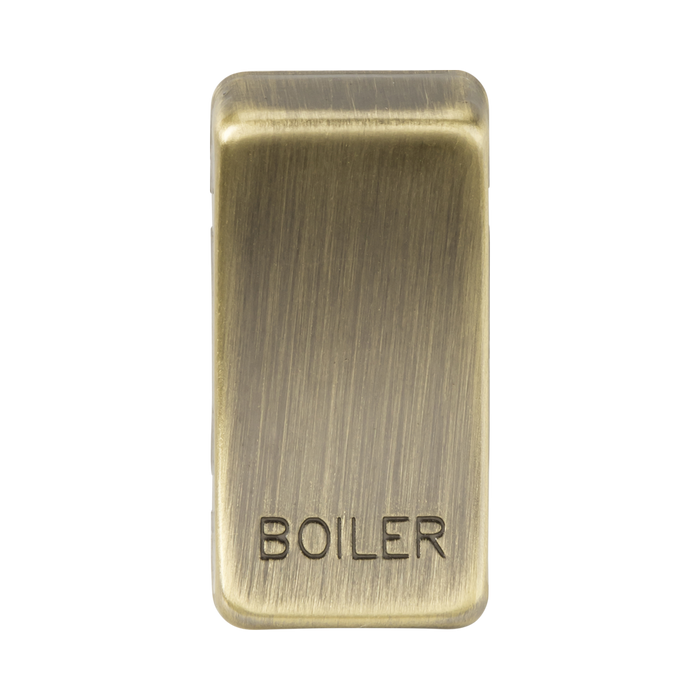 Brass rectangular object with 'BOILER' engraved on a white background