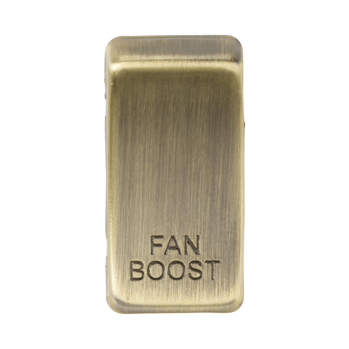 Rectangular brass fan boost button on a white background