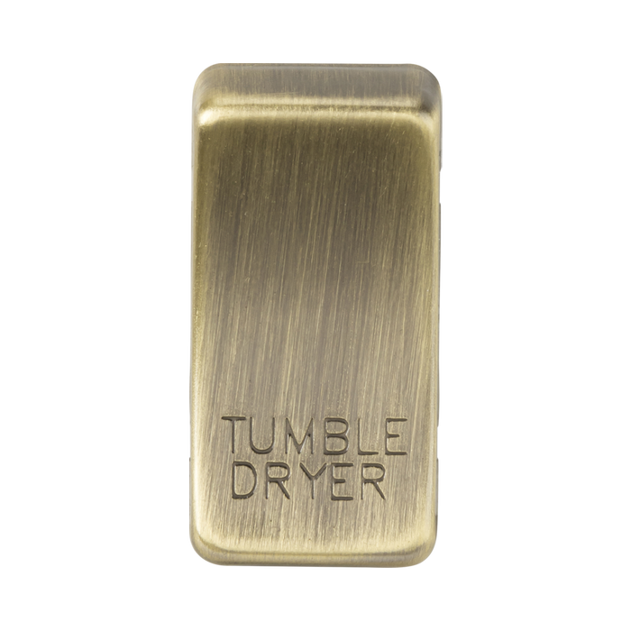 Brass toggle switch with 'TUMBLE DRYER' engraving on a white background
