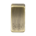 Brass toggle switch with 'TUMBLE DRYER' engraving on a white background