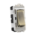 Toggle switch with brass rocker and white frame on a white background