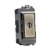 Brass electrical switch with 'EMG LTC' and 'TEST' labels on a white background
