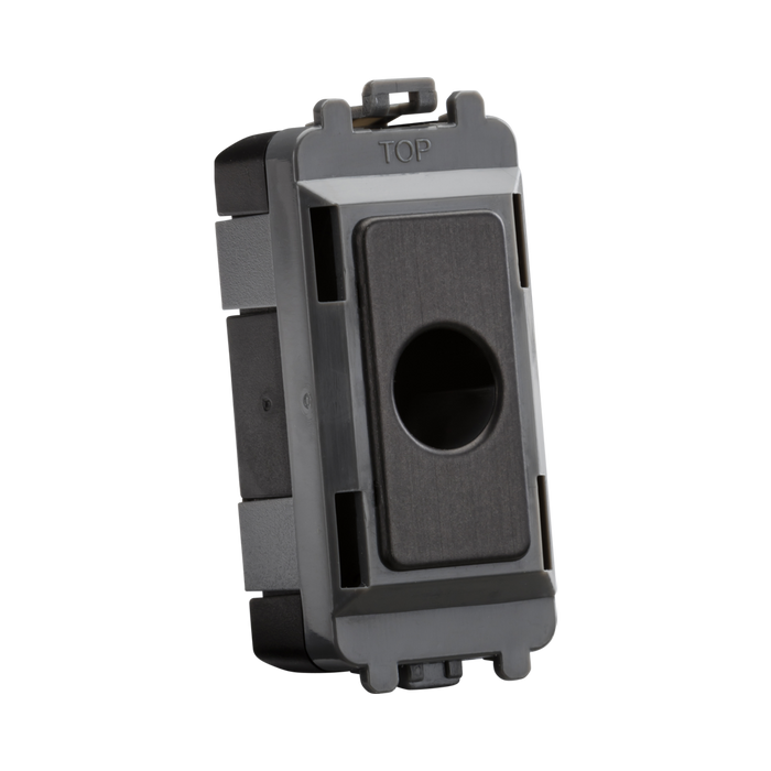 Black plastic component with a central hole on a white background