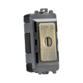 Electrical switch with brass and gray design on a white background