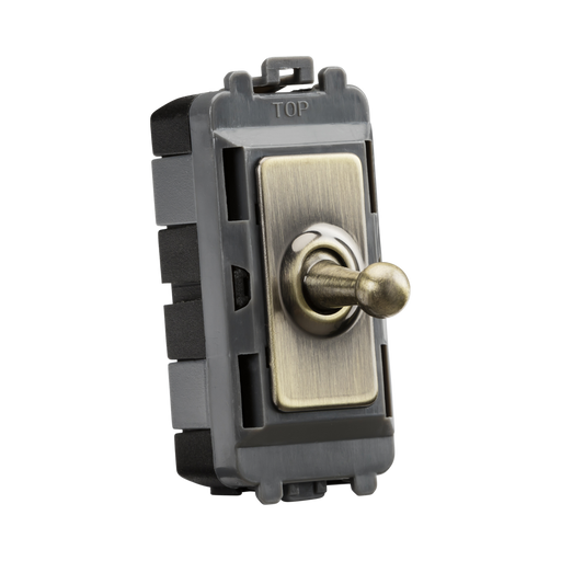 Toggle switch with brass-colored toggle on a white background