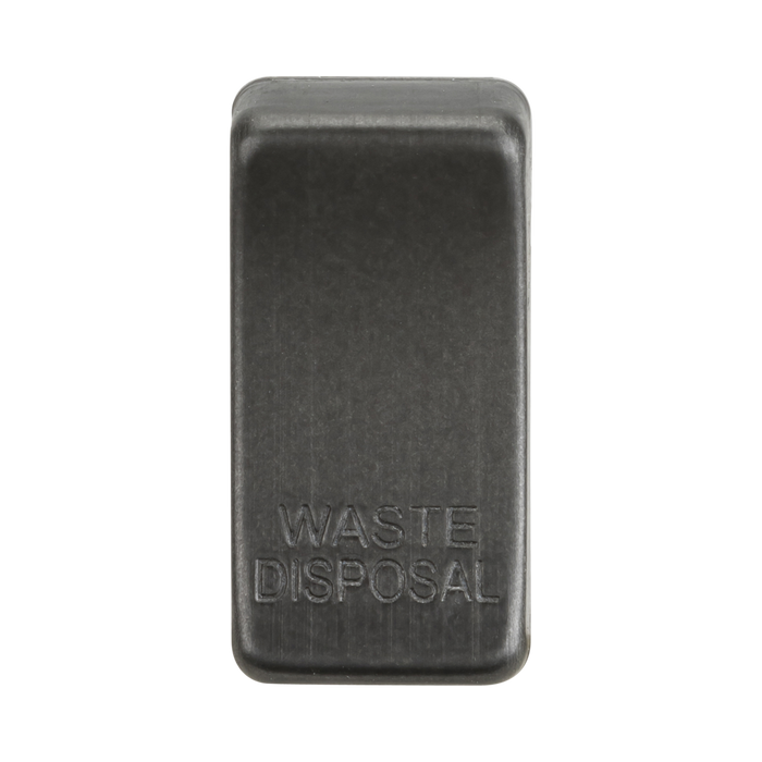 Rectangular smoked bronze waste disposal button on a white background
