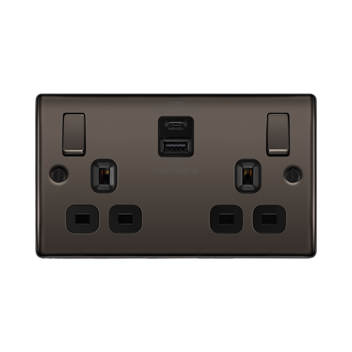 Black electrical socket with USB ports on a white background
