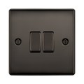 Black light switch with two rectangular buttons on a white background