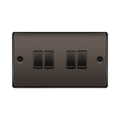 Black rectangular switch plate with four black switches on a white background