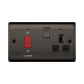 Black electrical socket with red button labeled 'ON COOKER' on a white background