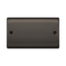 Rectangular black metal plate with two holes on a white background