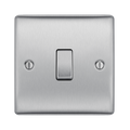 Metallic light switch on a white background