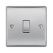 Metallic light switch on a white background