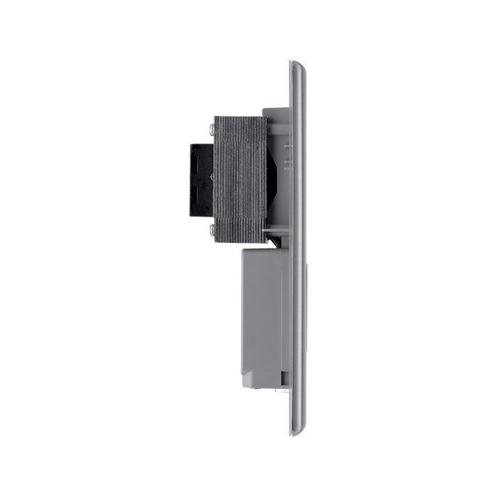 Metallic wall outlet with shaver socket label on a white background profile