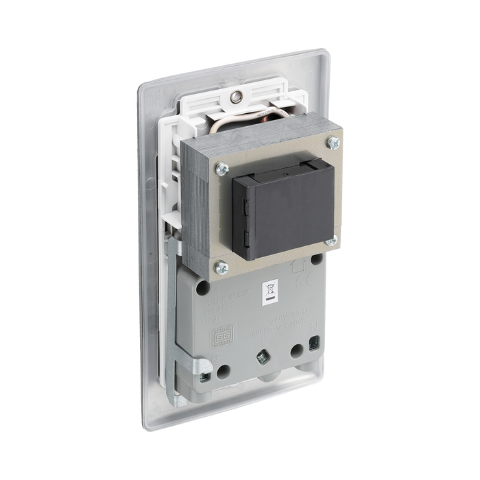 Metallic wall socket with shaver outlet label on a white background back