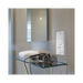 Metallic wall socket with shaver outlet label on a white background bathroom setting