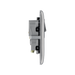 Metallic electrical socket with black inserts on a white background profile