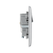 Metallic light switch with socket on a white background profile