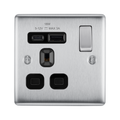 Metallic electrical socket with USB ports and switch on a white background