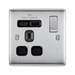 Metallic electrical socket with USB ports and switch on a white background
