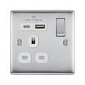 Metallic electrical switch with USB and socket outlets on a white background