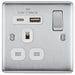 Metallic electrical socket with USB ports and switch on a white background