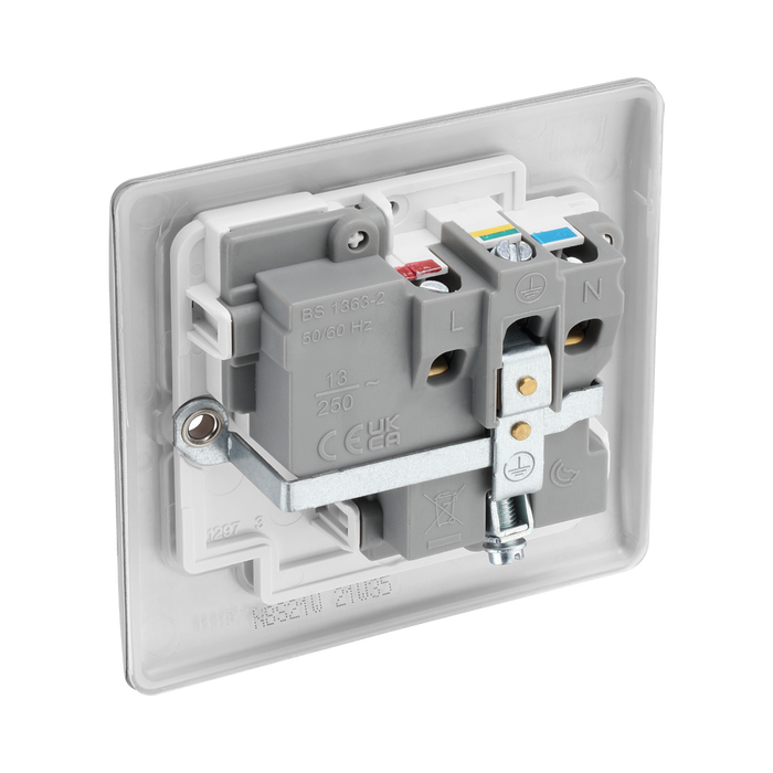 Metallic light switch with socket on a white background back