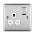 Metallic light switch with socket on a white background