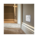 Metallic light switch with socket on a white background hall setting