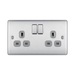 Metallic electrical switch with multiple sockets and switches on a white background