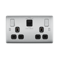 Silver electrical socket with multiple outlets on a white background