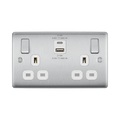 Silver electrical socket with multiple outlets and USB ports on a white background