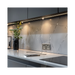 Silver electrical socket with multiple outlets and USB ports on a white background kitchen setting