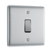Metallic light switch on a white background side