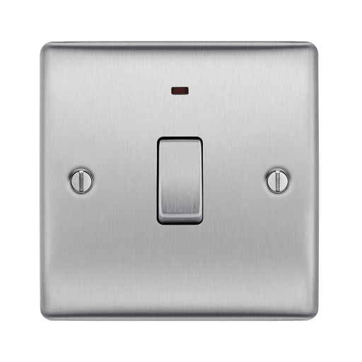Metallic light switch on a white background