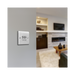 Metallic light switch on a white background living room setting