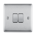 Metallic light switch on a white background