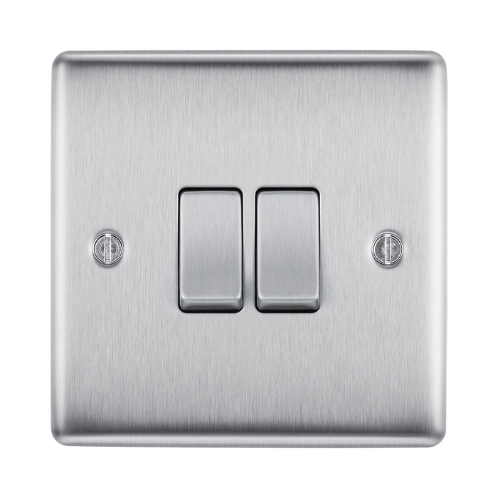 Metallic light switch on a white background