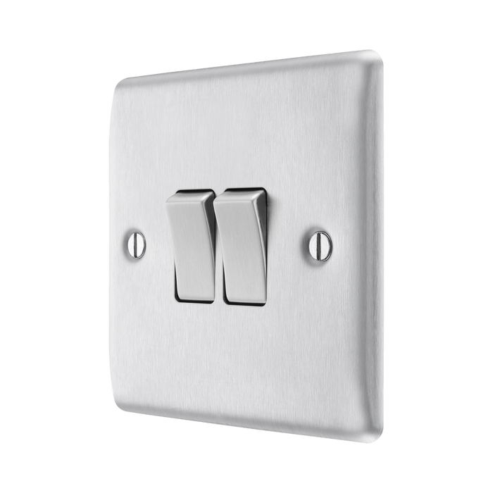 Metallic light switch on a white background side
