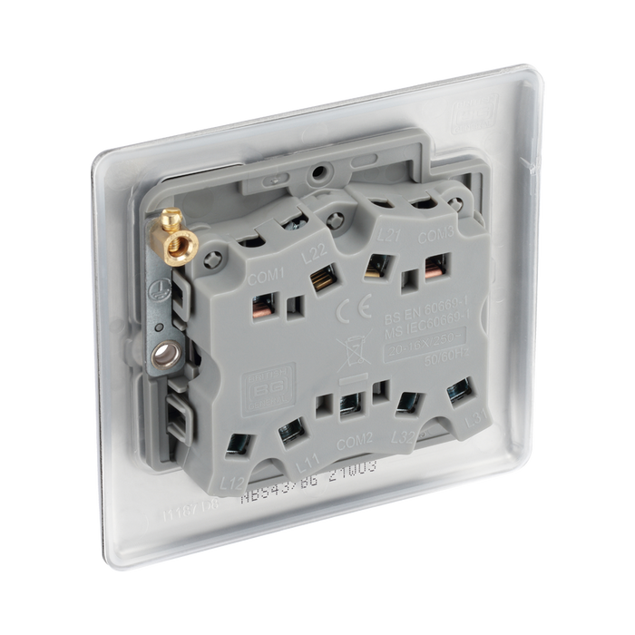 Metallic light switch panel with three toggle switches on a white background back