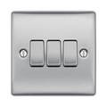 Metallic light switch panel with three toggle switches on a white background