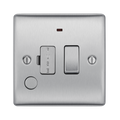 Metallic light switch with two toggle switches on a white background