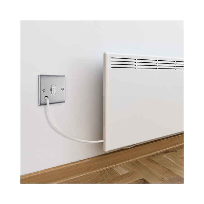 Metallic fuse switch on a white background wall setting