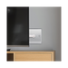 Metallic wall plate with TV socket on a white background with TV setting