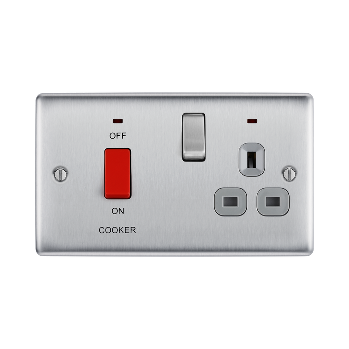 Electrical switch with red button labeled 'ON' and 'OFF', and text 'COOKER'.